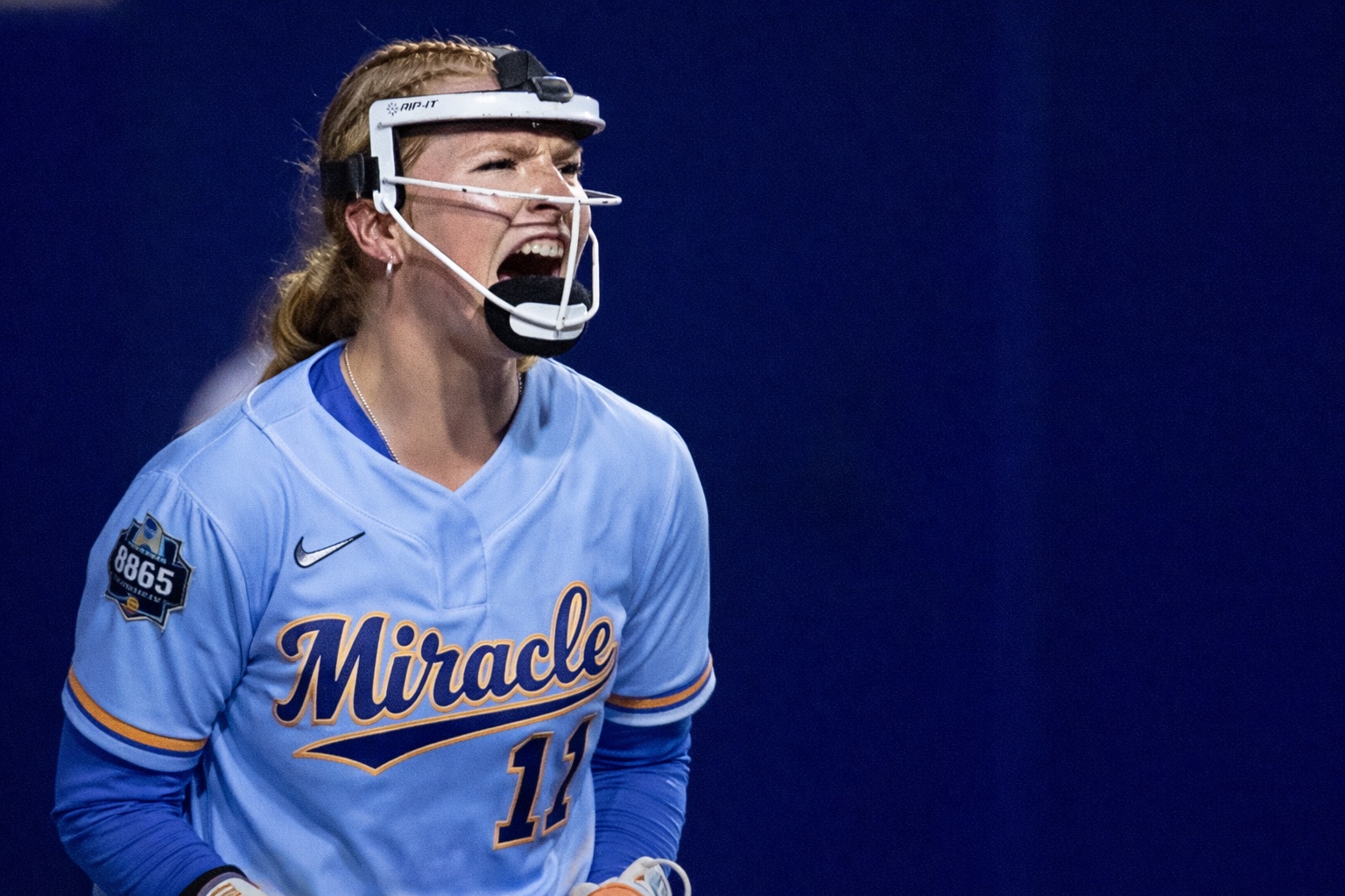 Knoxville Miracle player mid-roar in the batter's box